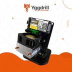 Nerdaxe Gamma Bitcoin miner mounted on stand with cooling fan, heatsink and digital display on white and orange background